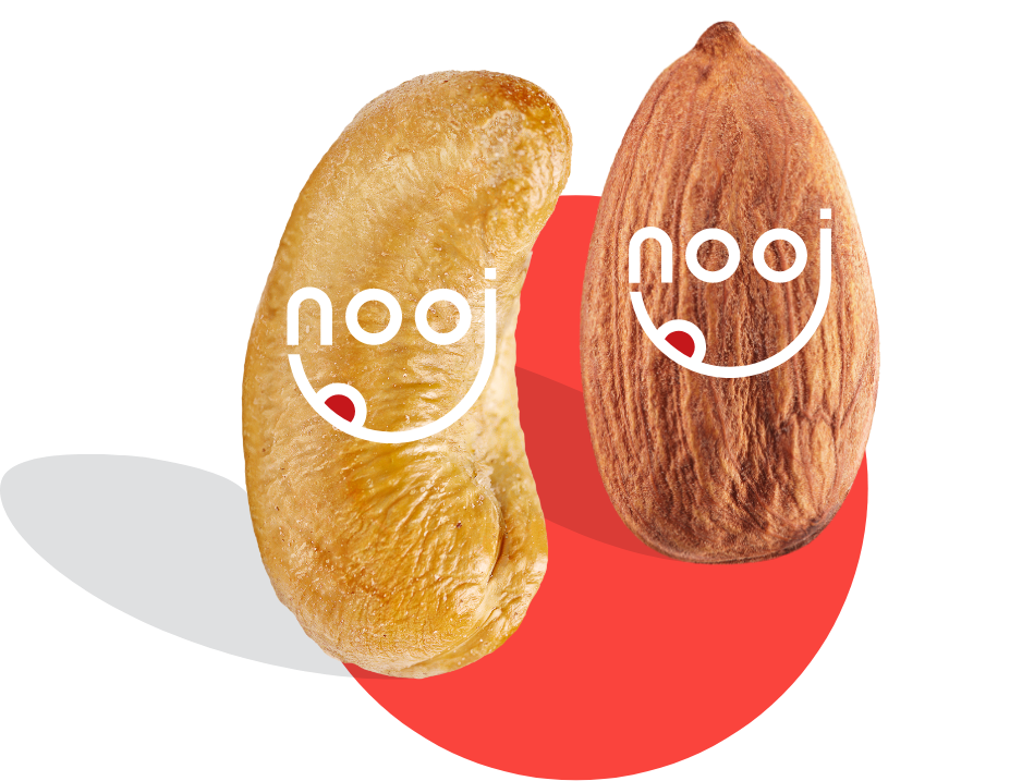graphic cashew and almond nuts together on a red dot